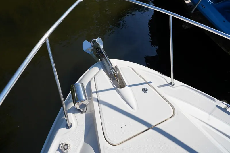 Slide: The Image of Bow of 2010 Sea Ray 370 Sundancer with anchor and railing. - 12