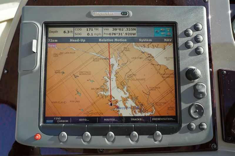 Slide: The Image of Navigation system on a 2010 Sea Ray 370 Sundancer displaying a nautical chart. - 51