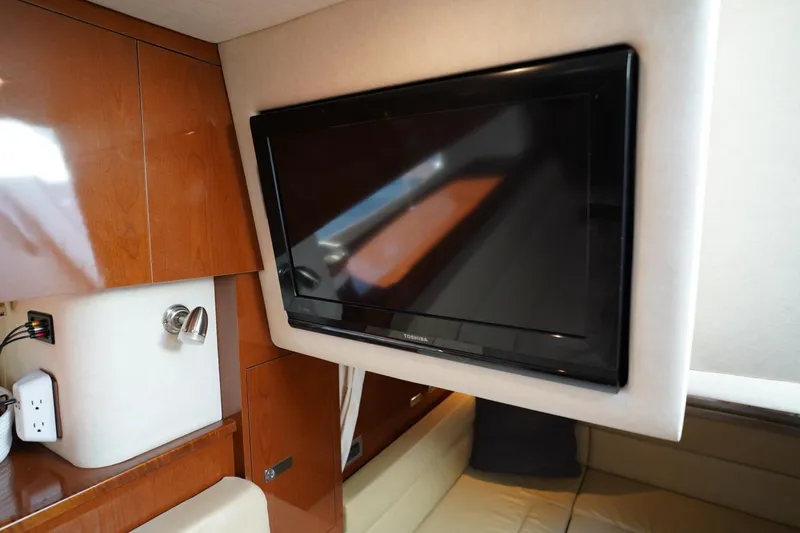 Slide: The Image of Interior of 2010 Sea Ray 370 Sundancer with wall-mounted Toshiba TV. - 60