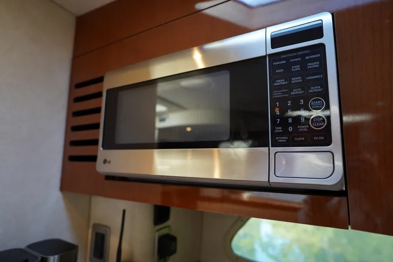 Slide: The Image of Microwave in 2010 Sea Ray 370 Sundancer yacht kitchen, stainless steel finish. - 66