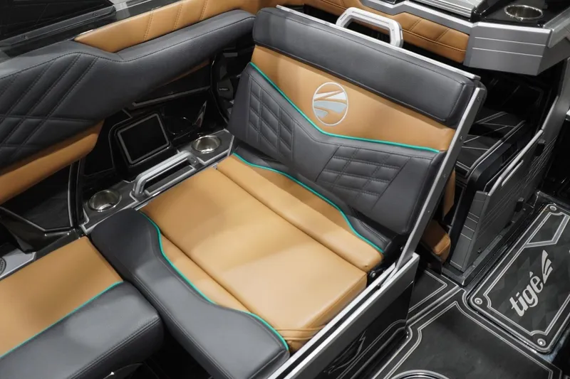 Slide: The Image of Luxurious interior seating of 2024 Tigé Ultré 25ZX boat with premium leather and modern design. - 100
