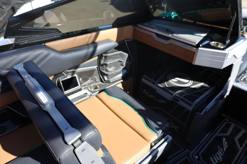 Slide: The Image of 2024 Tigé Ultré 25ZX interior with modern seating and sleek design. - 20