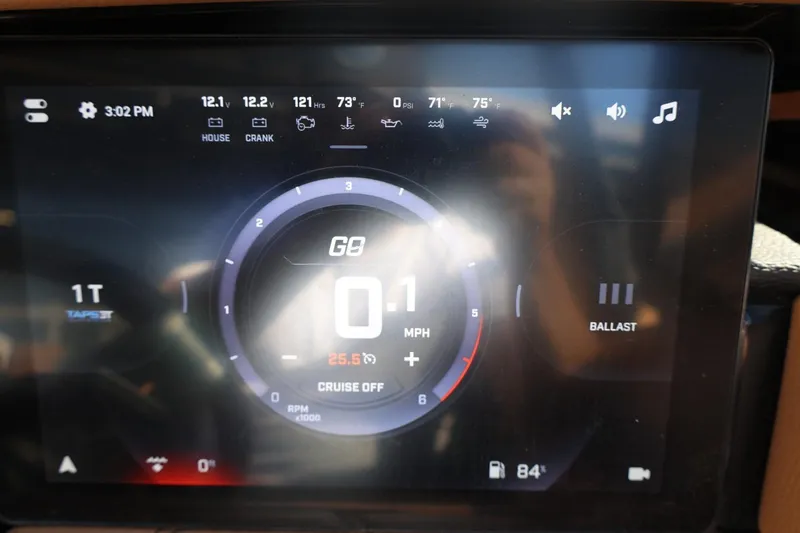 Slide: The Image of 2024 Tigé Ultré 25ZX dashboard display showing speed, ballast, and temperature settings. - 29