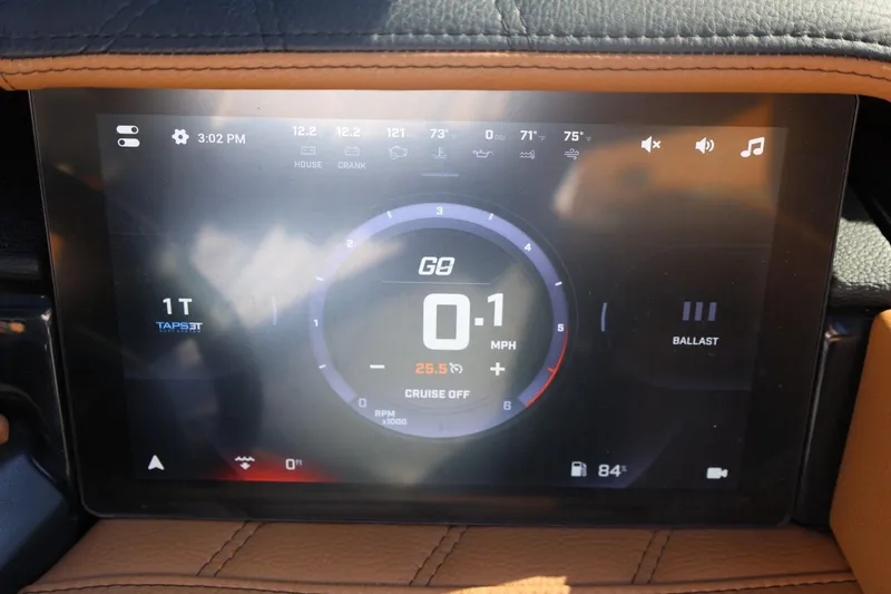 Slide: The Image of 2024 Tigé Ultré 25ZX dashboard display showing speed, ballast, and system indicators. - 30