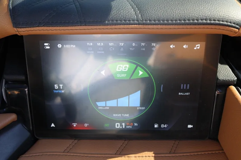 Slide: The Image of 2024 Tigé Ultré 25ZX touchscreen display showing surf settings and controls. - 32