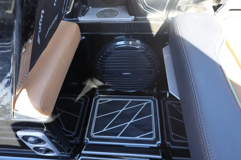 Slide: The Image of 2024 Tigé Ultré 25ZX interior with premium seating and Audison speaker system. - 47