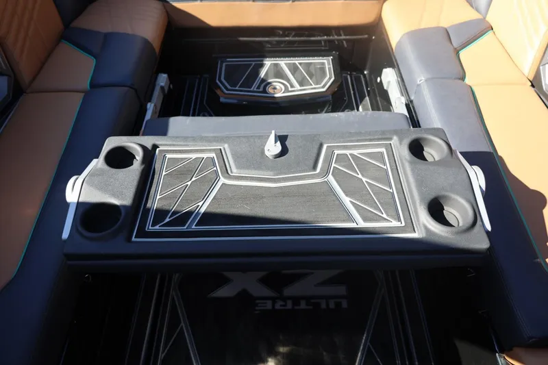 Slide: The Image of 2024 Tigé Ultré 25ZX interior with stylish seating and modern design elements. - 59