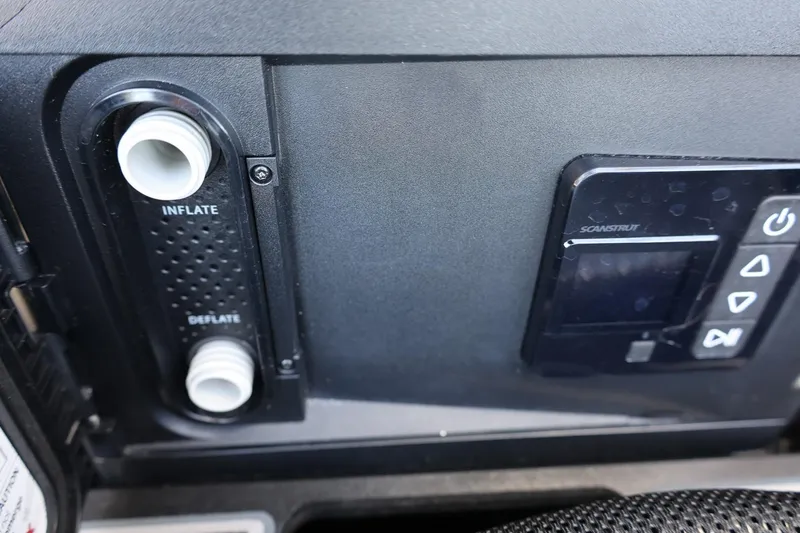 Slide: The Image of 2024 Tigé Ultré 25ZX control panel with inflate and deflate options. - 68