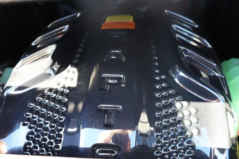 Slide: The Image of Close-up of 2024 Tigé Ultré 25ZX engine with shiny metallic details. - 71