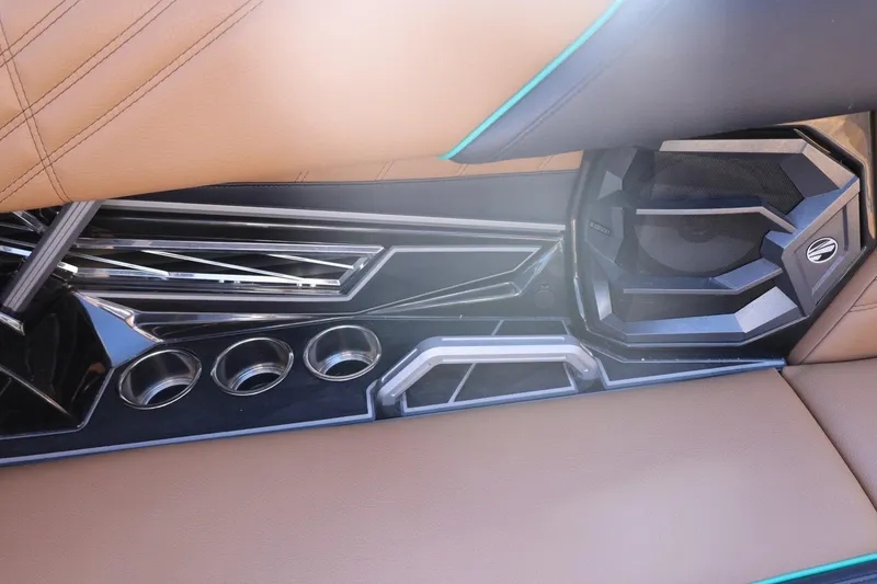 Slide: The Image of 2024 Tigé Ultré 25ZX interior detail with cup holders and speaker system. - 72