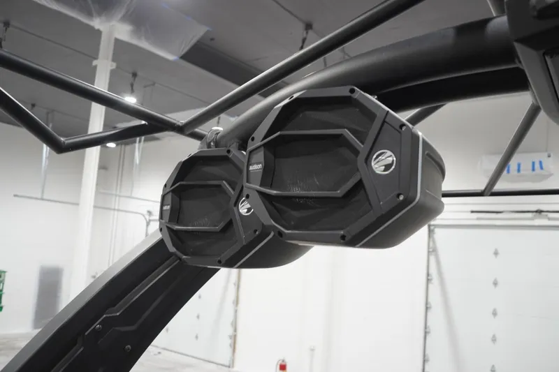 Slide: The Image of 2024 Tigé Ultré 25ZX boat speakers in a modern indoor setting. - 97