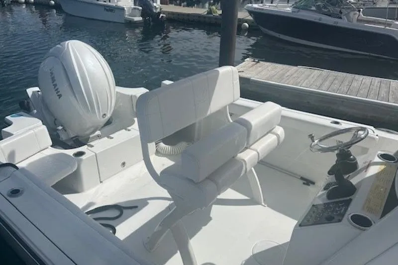 Slide: The Image of 2025 Parker 2200 Center Console boat with Yamaha engine at dock. - 10