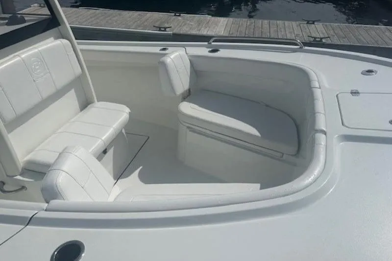 Slide: The Image of 2025 Parker 2200 Center Console boat interior with white seating and sleek design. - 3