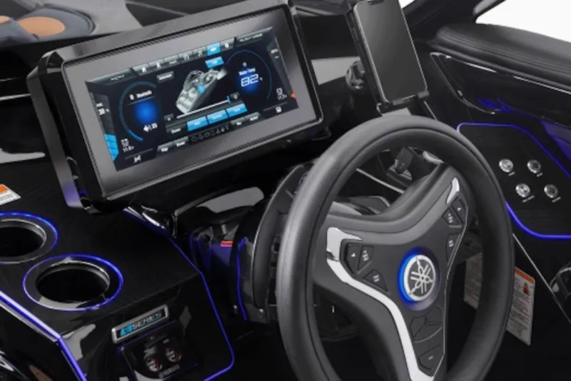 Slide: The Image of 2026 Yamaha Boats 275SD dashboard with advanced touchscreen and steering wheel controls. - 3