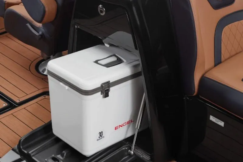 Slide: The Image of 2026 Yamaha Boats 275SD interior with Engel cooler and luxurious seating. - 5