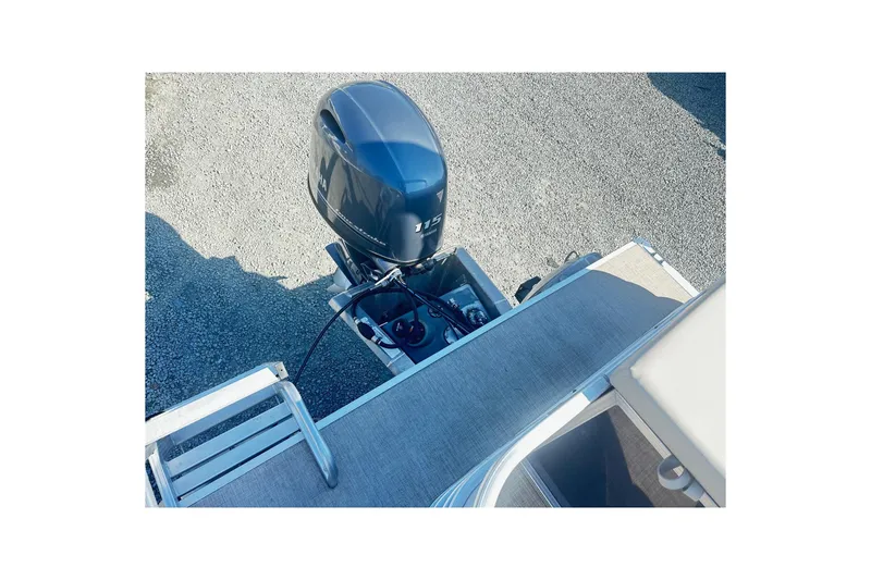 Slide: The Image of 2018 Berkshire 22CL CTS Pontoon with outboard motor on gravel surface. - 10