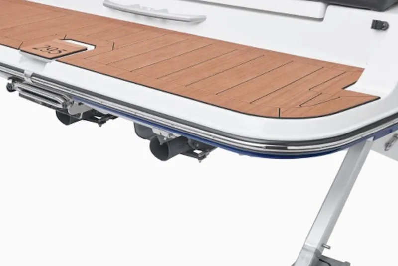 Slide: The Image of 2026 Yamaha Boats 295SE swim platform with sleek wood finish and stainless steel details. - 3