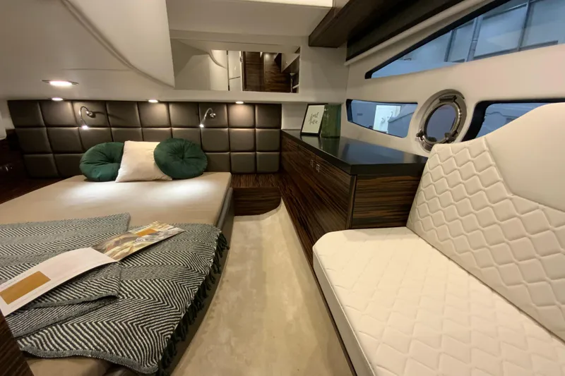 Slide: The Image of Luxurious interior of 2026 Cobrey 33 HT yacht with elegant seating and modern decor. - 7