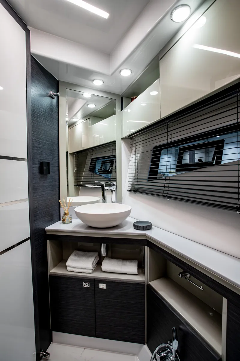 Slide: The Image of Luxurious bathroom interior of 2026 Cobrey 45 Fly yacht with modern fixtures and elegant design. - 15