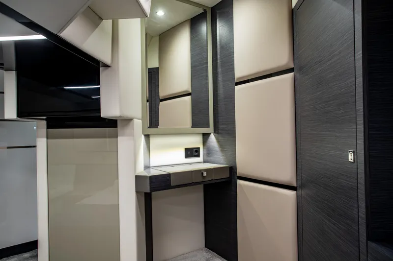 Slide: The Image of Luxurious interior of 2026 Cobrey 45 Fly yacht with modern design elements. - 16