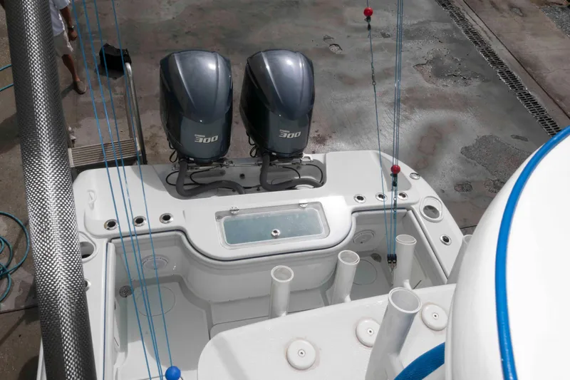 Slide: The Image of 2018 Yellowfin 32 Offshore boat with dual 300 horsepower engines, docked and ready for fishing. - 25