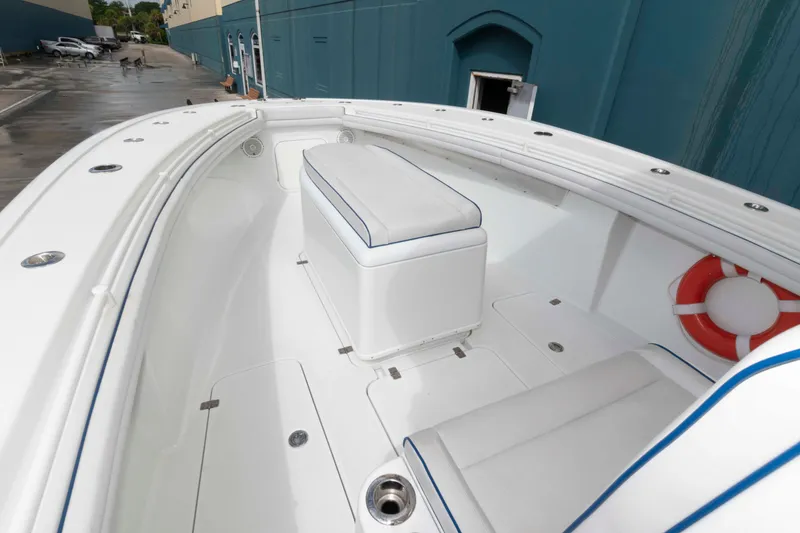 Slide: The Image of 2018 Yellowfin 32 Offshore boat interior with seating and life preserver. - 3
