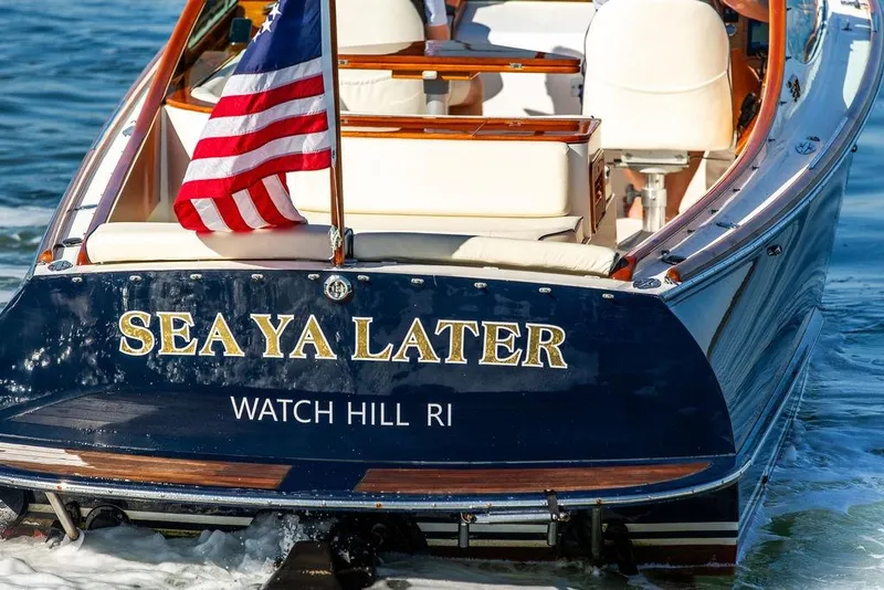 Slide: The Image of Hinckley T29R 2003 boat named "Sea Ya Later" with American flag, Watch Hill RI. - 35