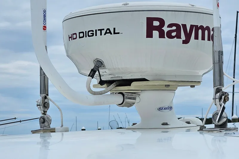 Slide: The Image of Radar equipment on a 2005 Topaz 24 Silverhawk boat, featuring Raymarine HD Digital technology. - 25