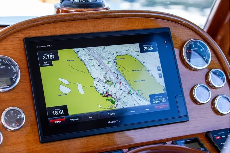 Slide: The Image of Hinckley Picnic Boat MKIII 2017 dashboard with Garmin GPS navigation system and gauges. - 29