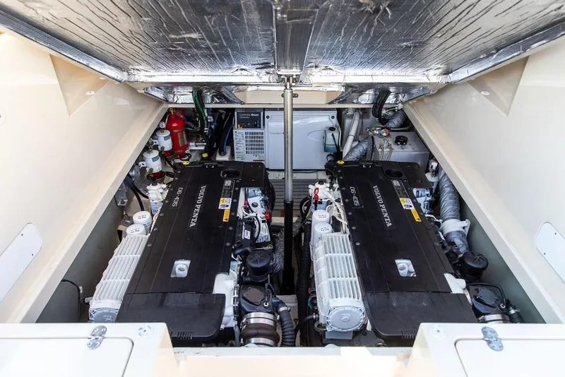 Slide: The Image of Engine compartment of 2017 Hinckley Picnic Boat MKIII with dual Volvo Penta engines. - 46