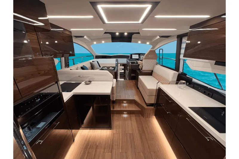 Slide: The Image of Luxurious interior of 2026 Cobrey 52 FLY yacht with modern design and ocean view. - 12