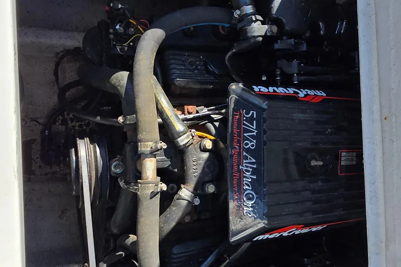 Slide: The Image of Engine compartment of a 1992 Wellcraft Eclipse 233 with MerCruiser 5.7L V8 Alpha One engine. - 4