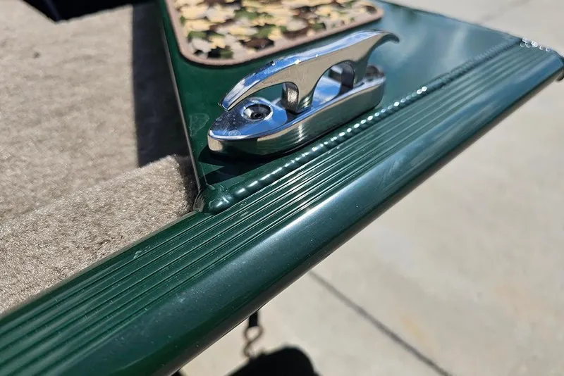 Slide: The Image of Close-up of 2026 Tracker Bass Tracker Classic Limited boat cleat and textured surface. - 17