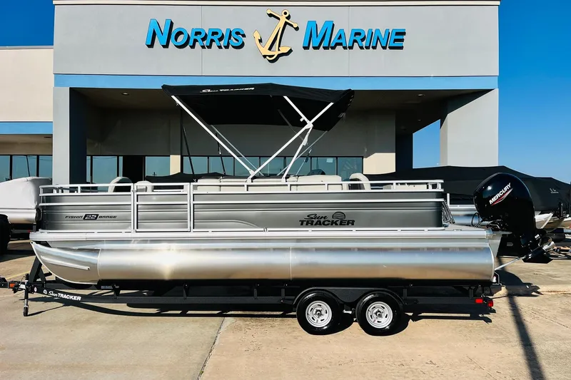 The Image of 2026 Sun Tracker Fishin' Barge 22 DLX pontoon boat at Norris Marine dealership. - 0