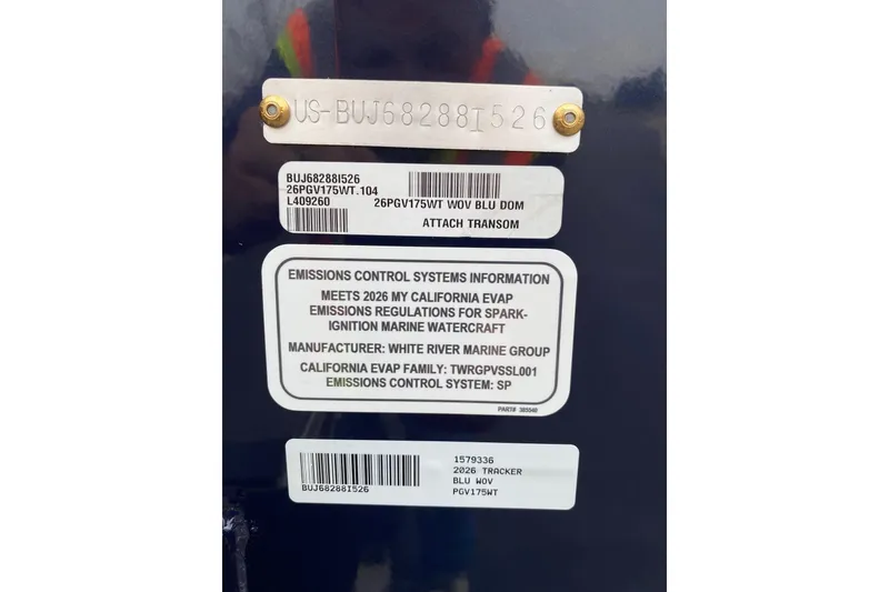 Slide: The Image of 2026 Tracker Pro Guide V-175 WT emissions control information label on boat transom. - 12