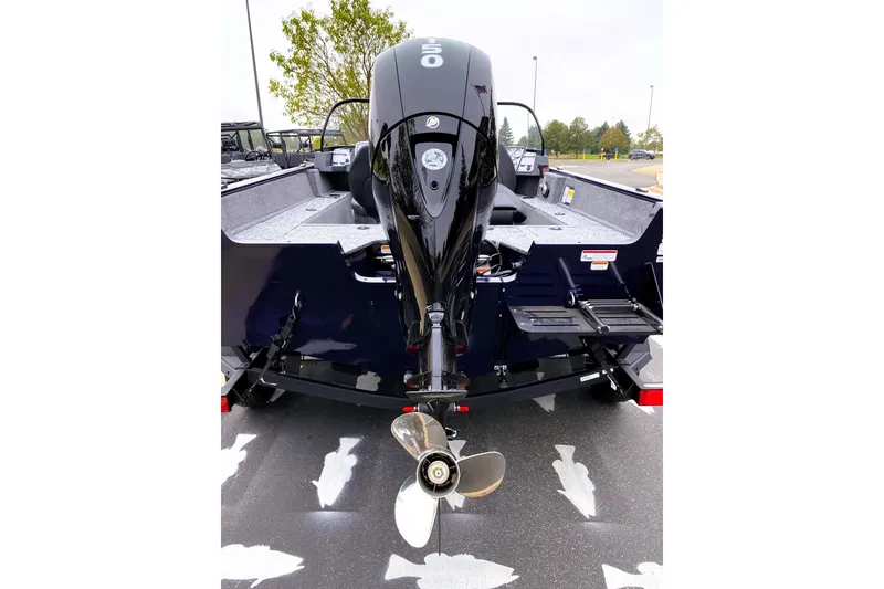 Slide: The Image of 2026 Tracker Pro Guide V-175 WT boat rear view with outboard motor. - 3