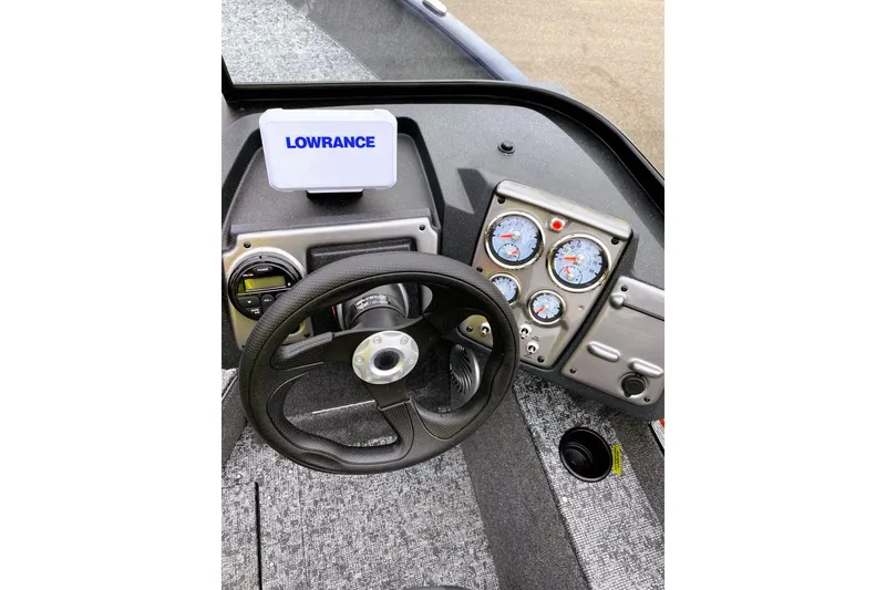 Slide: The Image of 2026 Tracker Pro Guide V-175 WT boat dashboard with Lowrance display and gauges. - 6