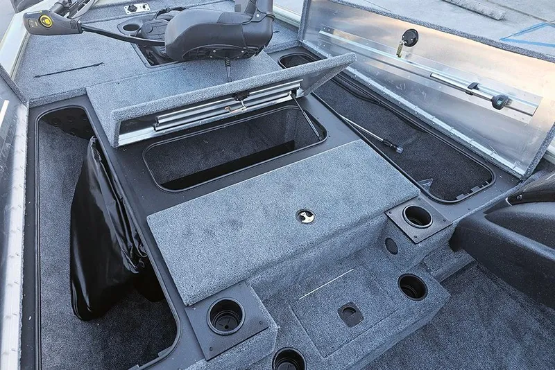 Slide: The Image of 2026 Tracker Pro Team 195 boat interior with storage compartments and seating. - 16