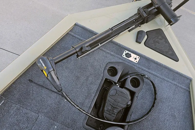 Slide: The Image of 2026 Tracker Pro Team 195 boat deck with trolling motor and foot pedal controls. - 19