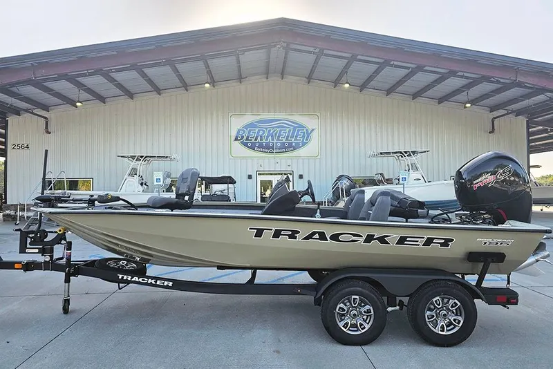 The Image of 2026 Tracker Pro Team 195 boat on trailer outside Berkeley Outdoors. - 2