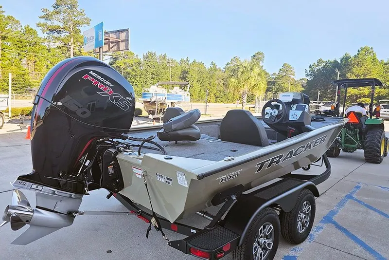 Slide: The Image of 2026 Tracker Pro Team 195 boat with Mercury Pro XS engine on trailer. - 8