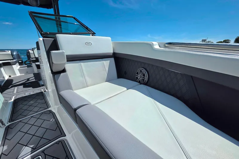 Slide: The Image of 2024 Cobalt R8 Outboard boat interior with luxurious seating and modern design. - 17