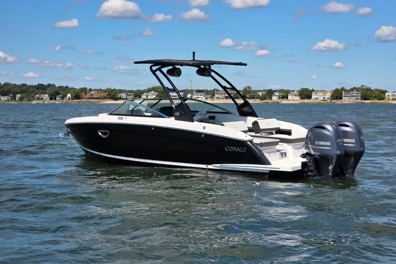 Slide: The Image of 2024 Cobalt R8 Outboard boat on water, featuring dual Yamaha engines. - 4