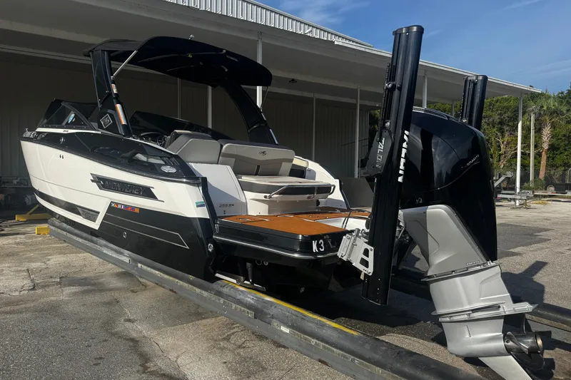 Slide: The Image of 2021 Monterey 255SS Super Sport boat with dual engines, docked outdoors. - 23