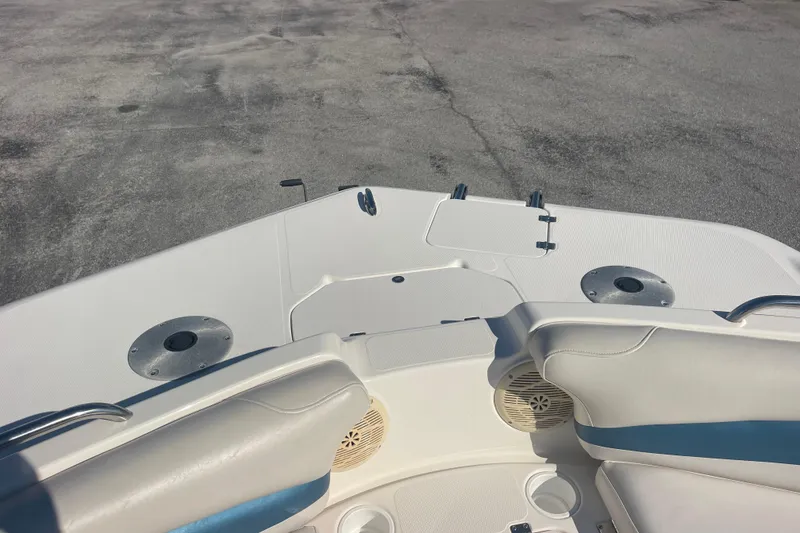 Slide: The Image of 2006 Hurricane FunDeck GS 202 OB boat deck with seating and storage compartments. - 34