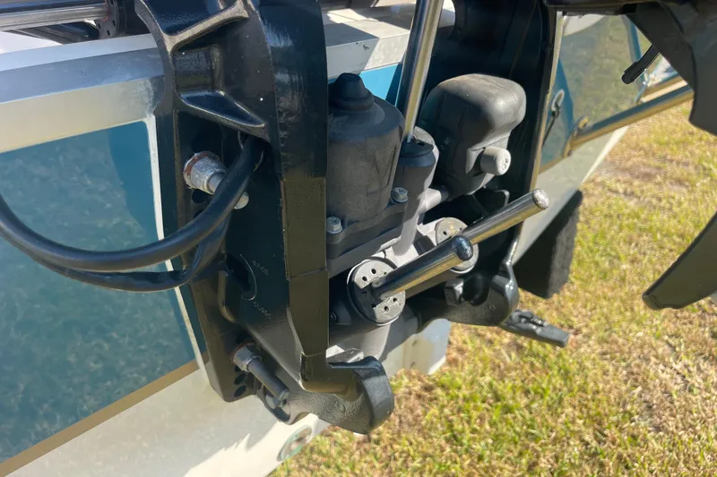 Slide: The Image of Close-up of 2006 Hurricane FunDeck GS 202 OB boat engine components. - 9