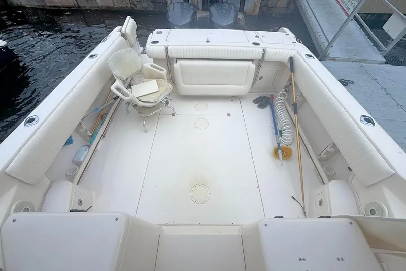 Slide: The Image of 2012 Grady-White Marlin 300 boat interior with seating and cleaning tools. - 5