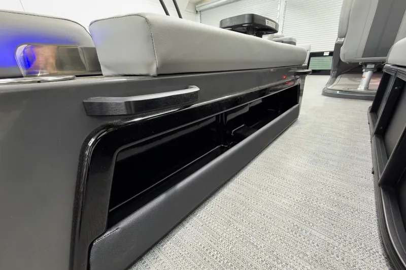 Slide: The Image of Interior view of 2026 Godfrey Monaco 23' Tritoon, featuring sleek seating and storage. - 41