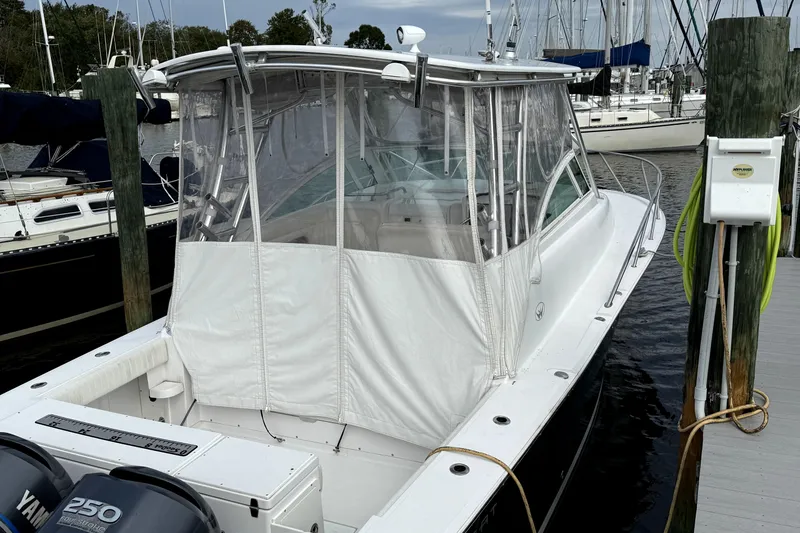 Slide: The Image of Compact bathroom in 2008 Southport 28 Express boat with sink and toilet. - 12