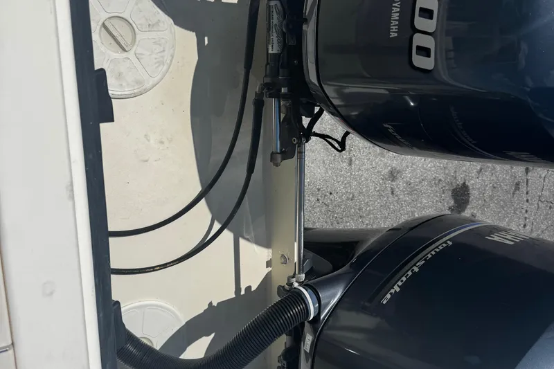 Slide: The Image of 2007 Parker 2520 XLD Sport Cabin with Yamaha outboard motors, rear view. - 16